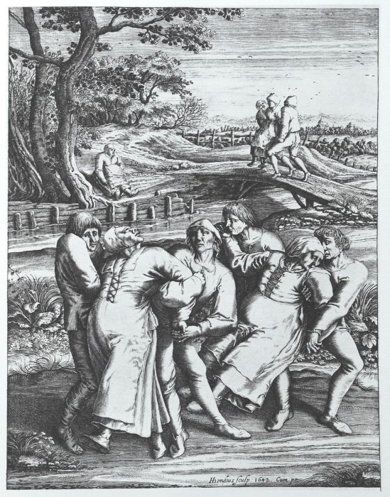 An illustration showing dancing mania in the 1500s. Two women are restrained by four men.