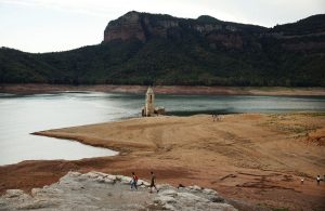 ancient church steeple emerging from water