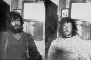 two crazed-looking explorers