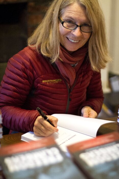 The author signing books.