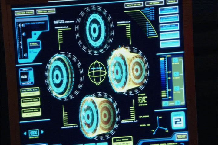 A bunch of glowing blue diagrams on a display screen.