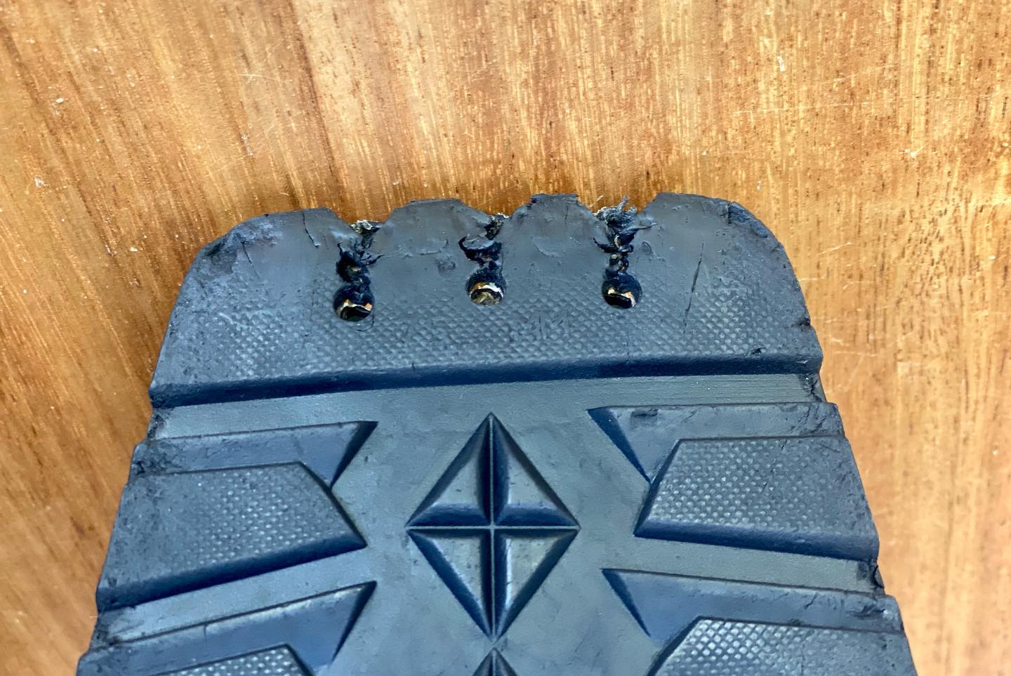 torn 3-pin boot
