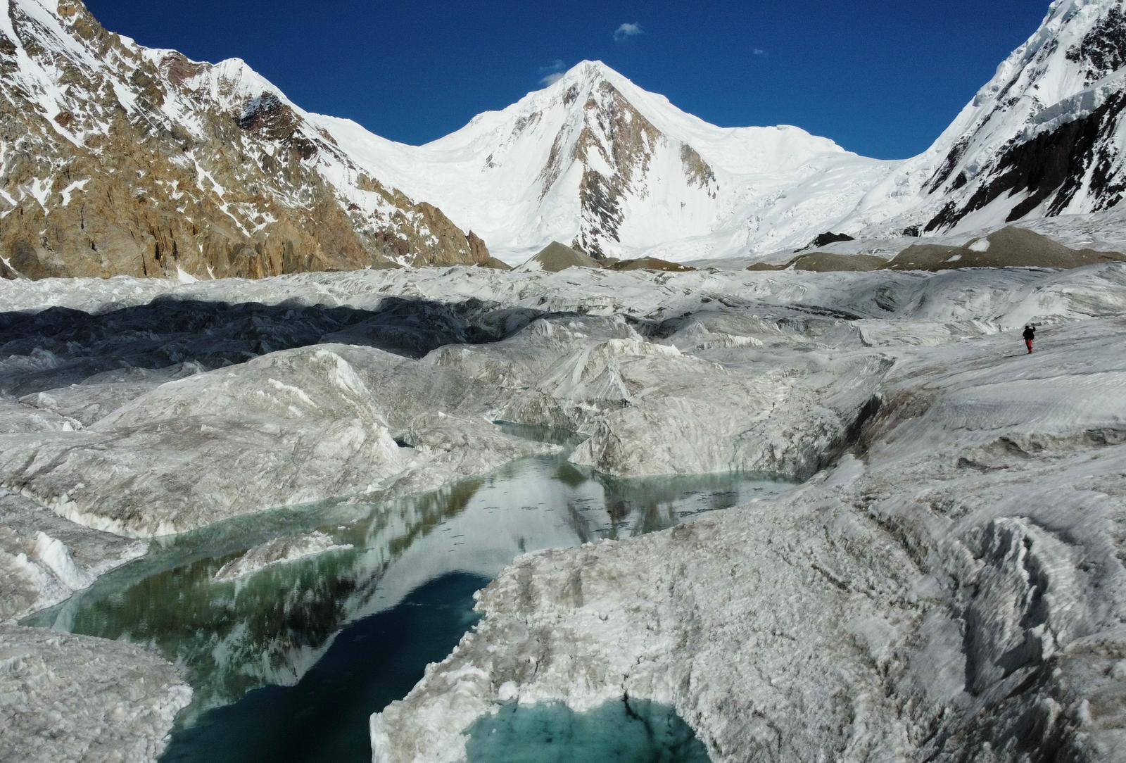 Gasherbrum I in the distance, with the broken glacier in front.