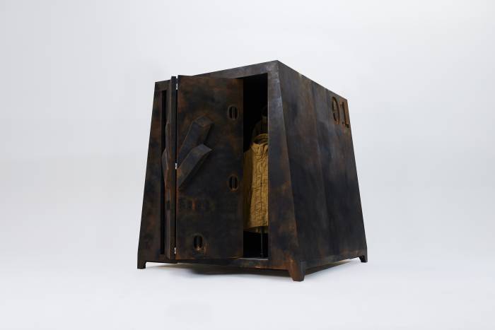 a large metal Vollebak wardrobe against a white background