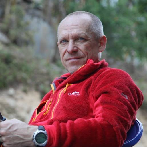 Close sot of hamor in red polar fleece, with an outdoor background.