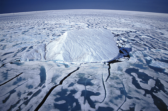 iceberg frozen in sea ice