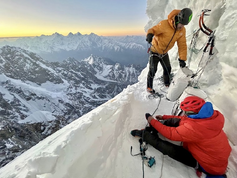Maarten van Haeren and Ethan Berman booting up at the bivouac at 6,650m. 