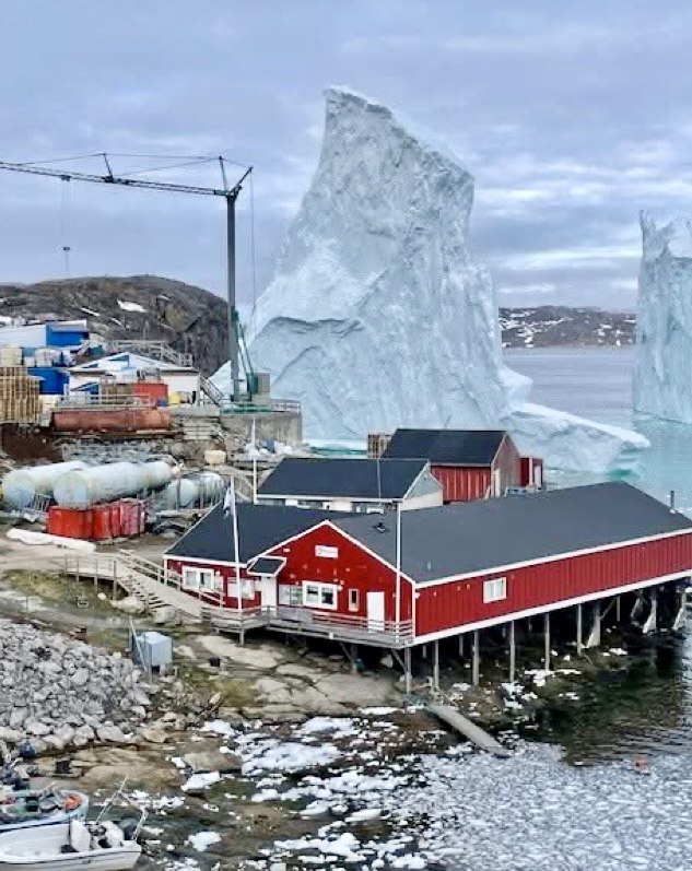 The iceberg at Innaarsuit's shore in July 2025.