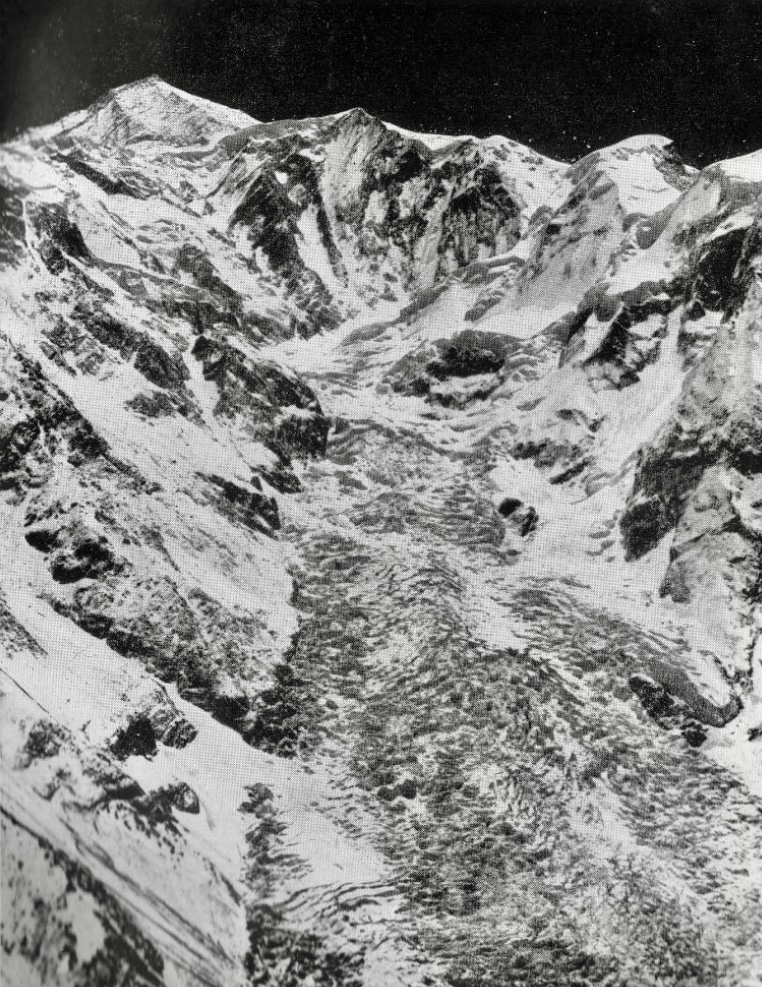 Rakaposhi seen from the west. The Southwest Spur can be seen on skyline, and Monk's Head is extreme right. 