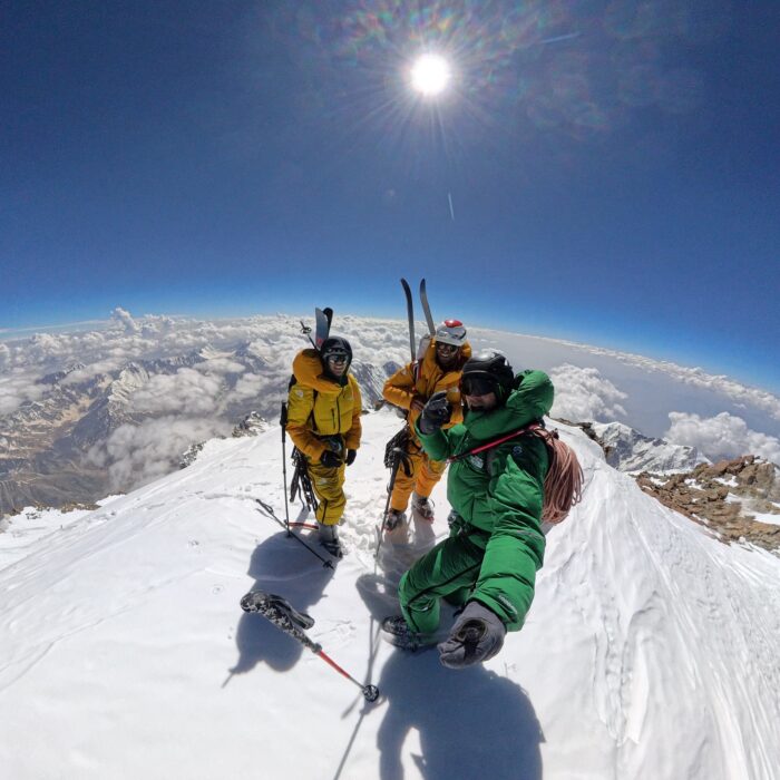 Goettler, Duperier and Langenstein pose on the summit of Nanga Parbat after climbing the Schell route. 