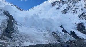 huge snow avalanche comes down Nanga Parbat's Kinshoffer face.