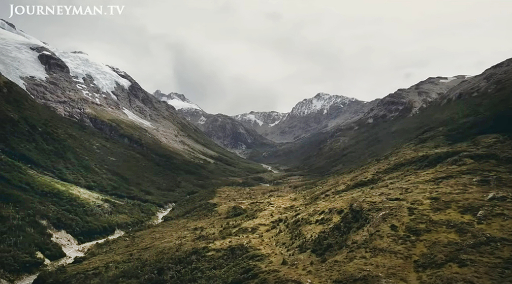 A river valley flanked by mountains