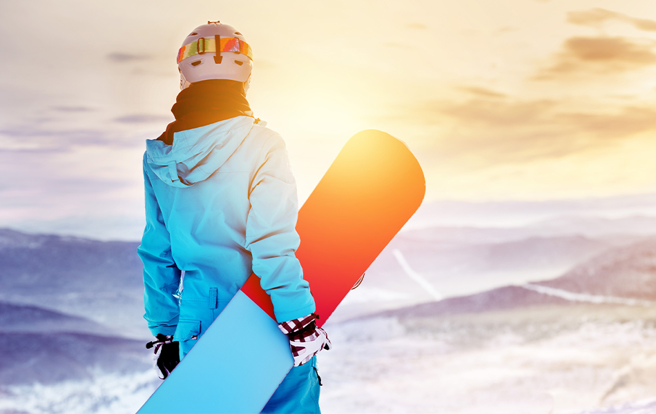 person holding snowboard