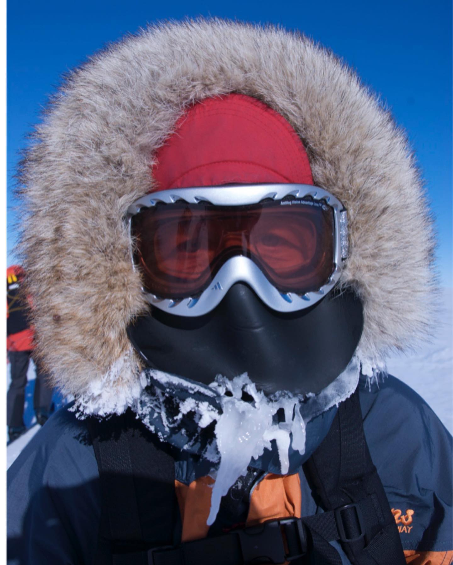 Merete Gjertsen with a short wolf ruff skiing Ronne Ice Shelf to South Pole, December 2007.