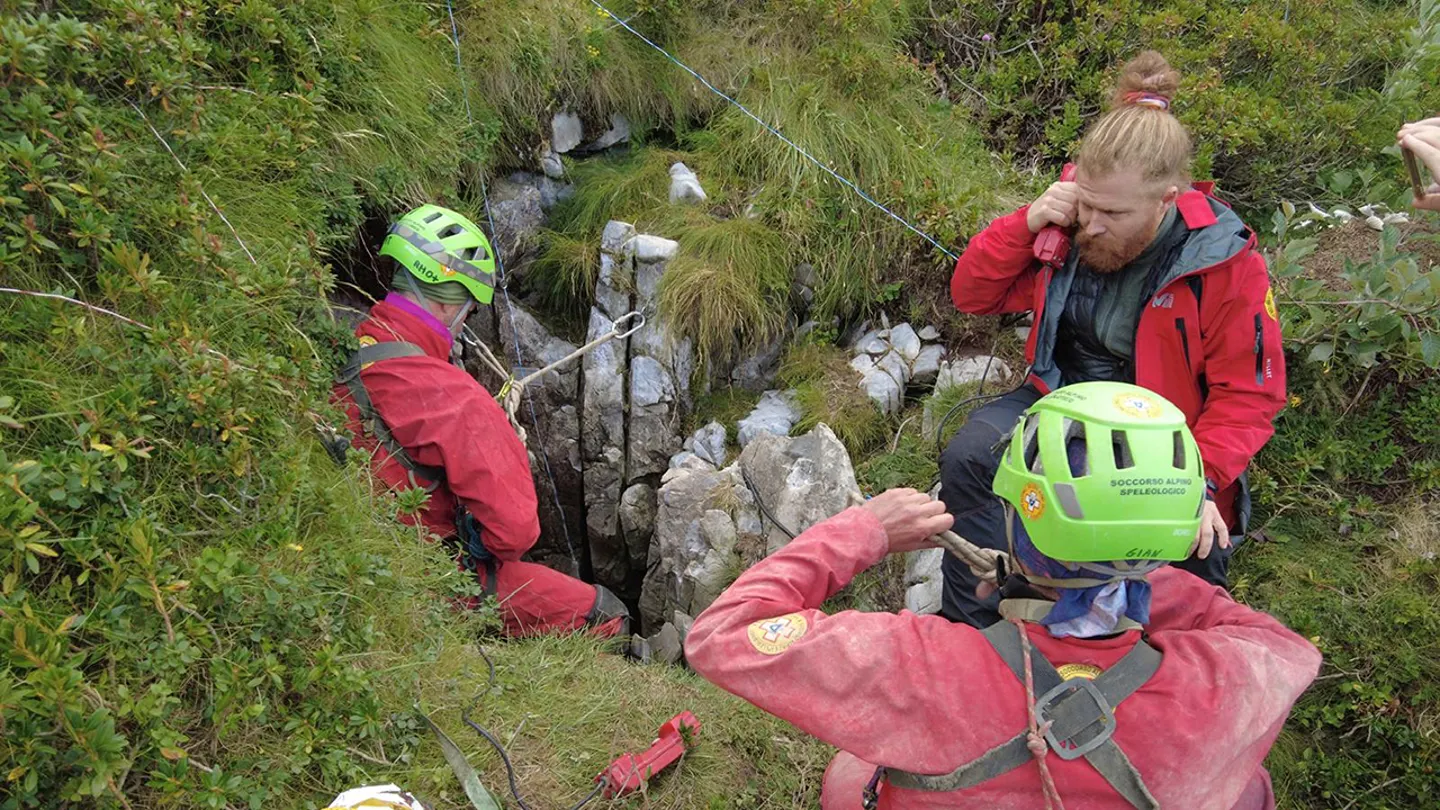 Italian rescue teams extract an injured caver from 40m underground in the Abisso Paperino cave system.